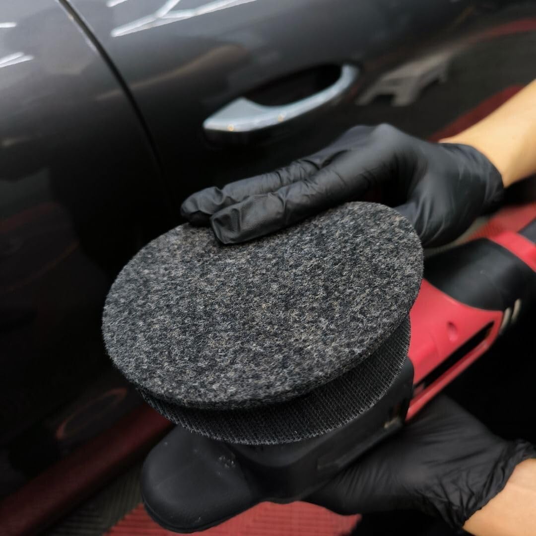 Planet Car Care CarPro rayon glass polishing pad attached to a buffer for removing water spots from automotive glass