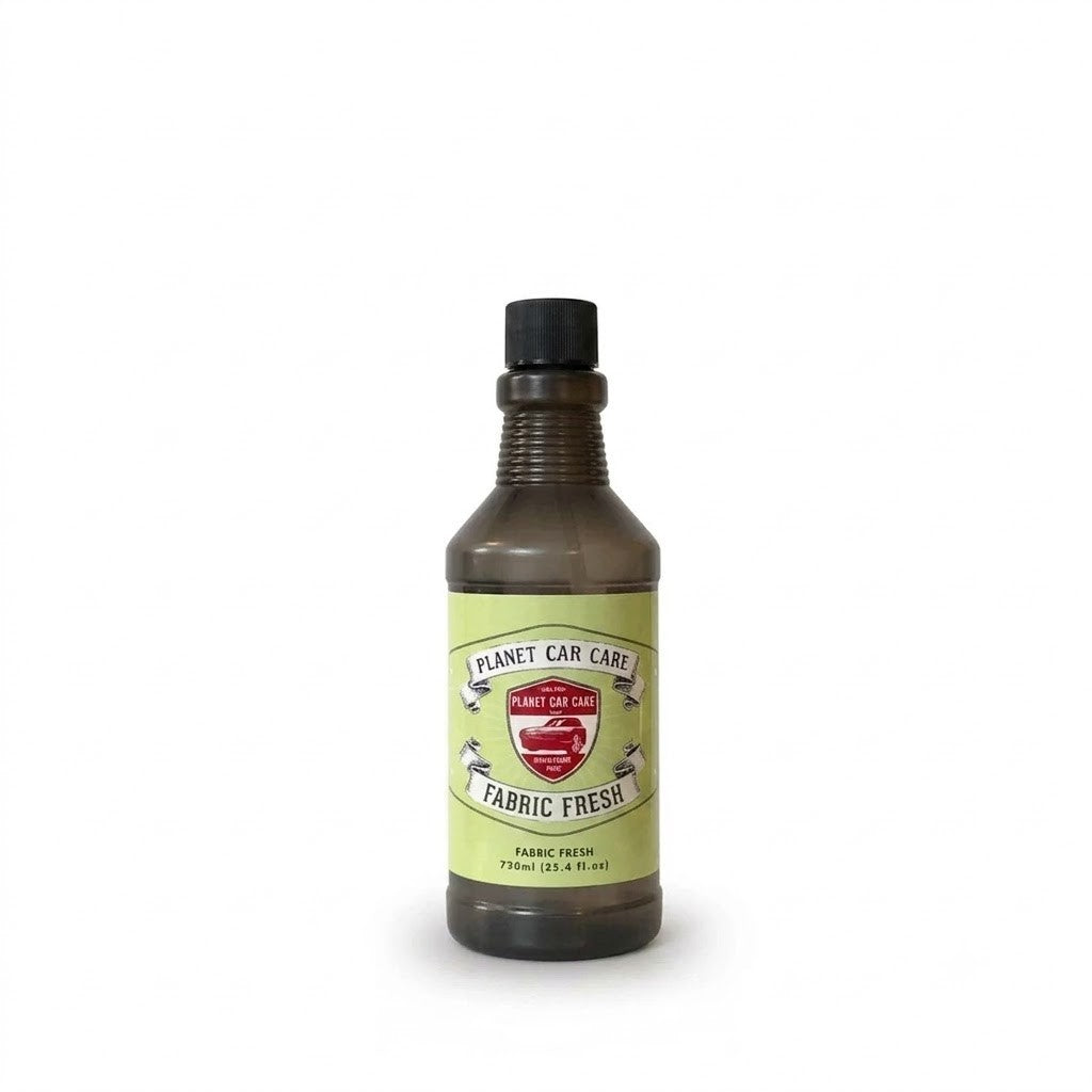Planet Car Care Fabric Fresh upholstery cleaner in a 750ml bottle with a light green label and vintage car logo.