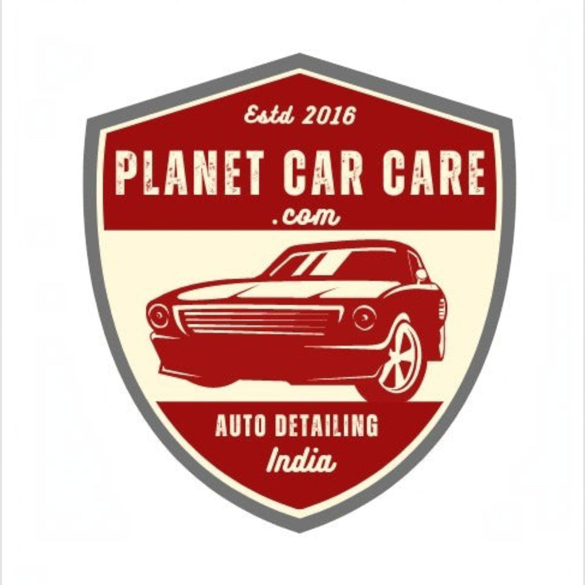Planet Car Care logo featuring a vintage car illustration inside a red and cream shield emblem