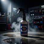 Planet Car Care Ultimate Degreaser in a reusable spray bottle, set in a professional auto detailing garage workshop.